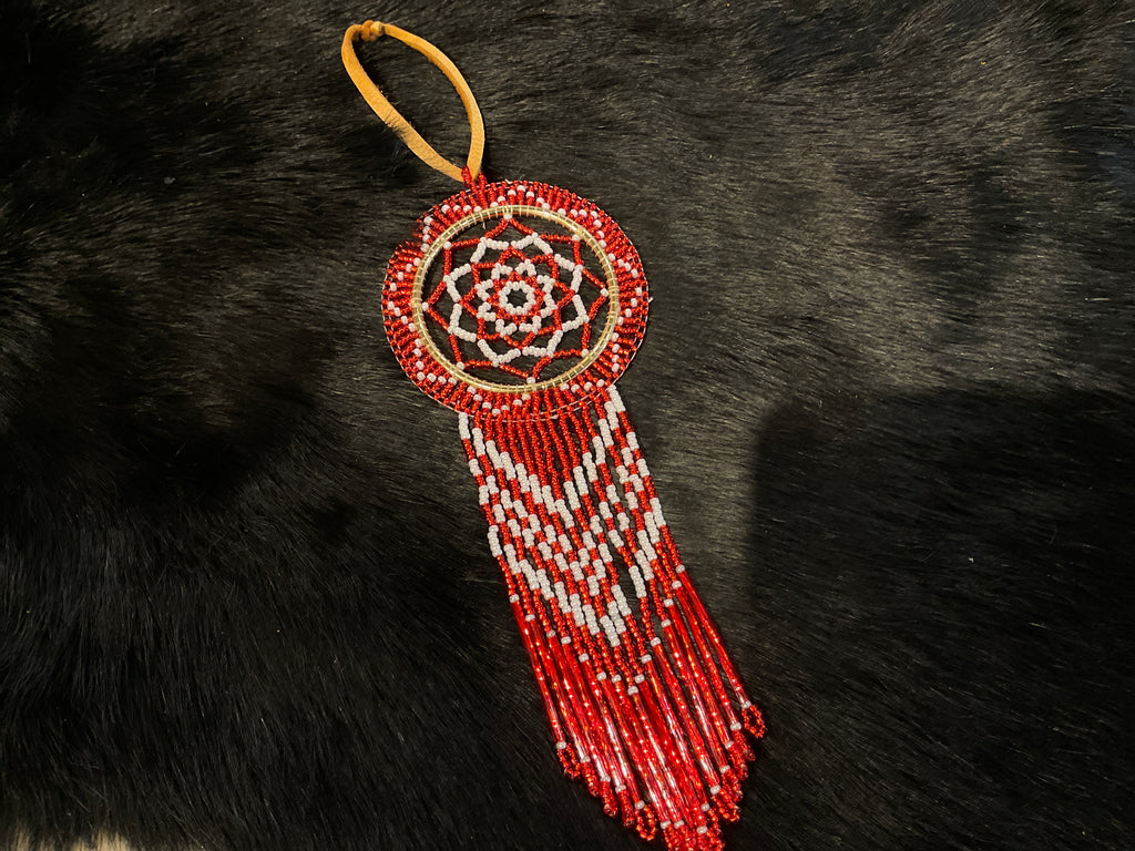 red and white beaded dream weaver