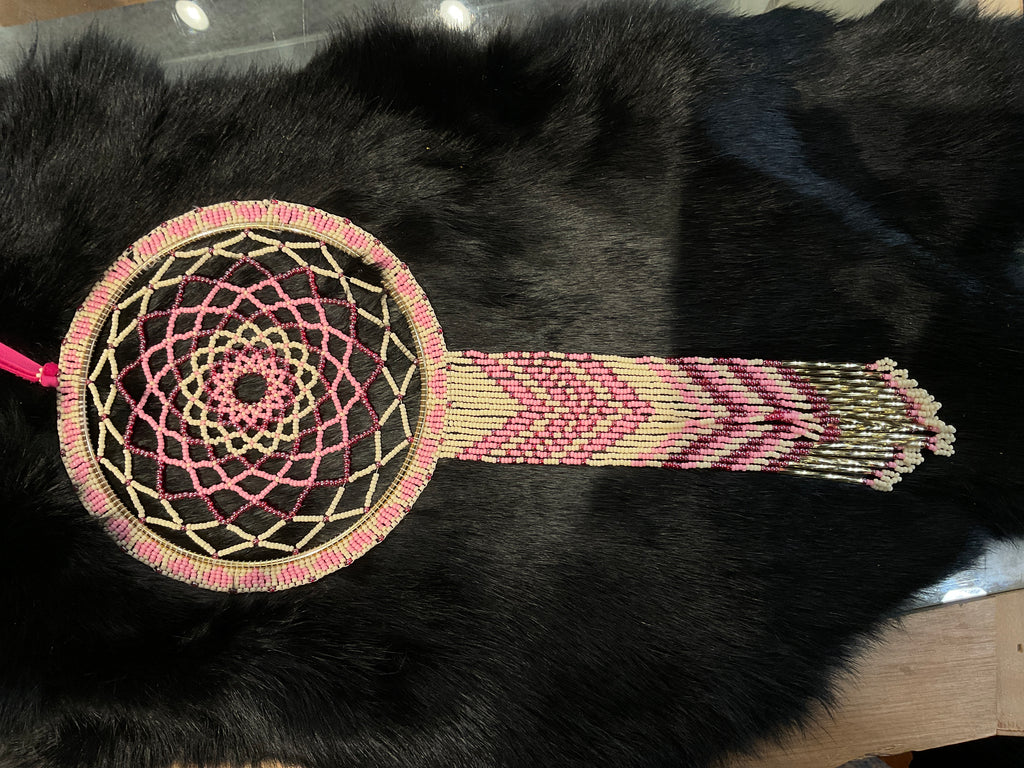 pink and yellow beaded dream catcher